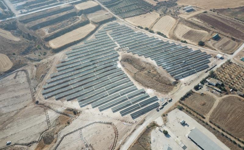 Aerial view of a 3 MWp solar plant in Cyprus surrounded by farmland